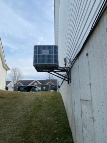 hvac unit suspended off the ground